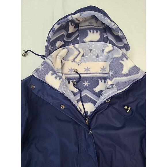 navy blue hooded anorak rain jacket with a polar bear print fleece lining. - Picture 2 of 6